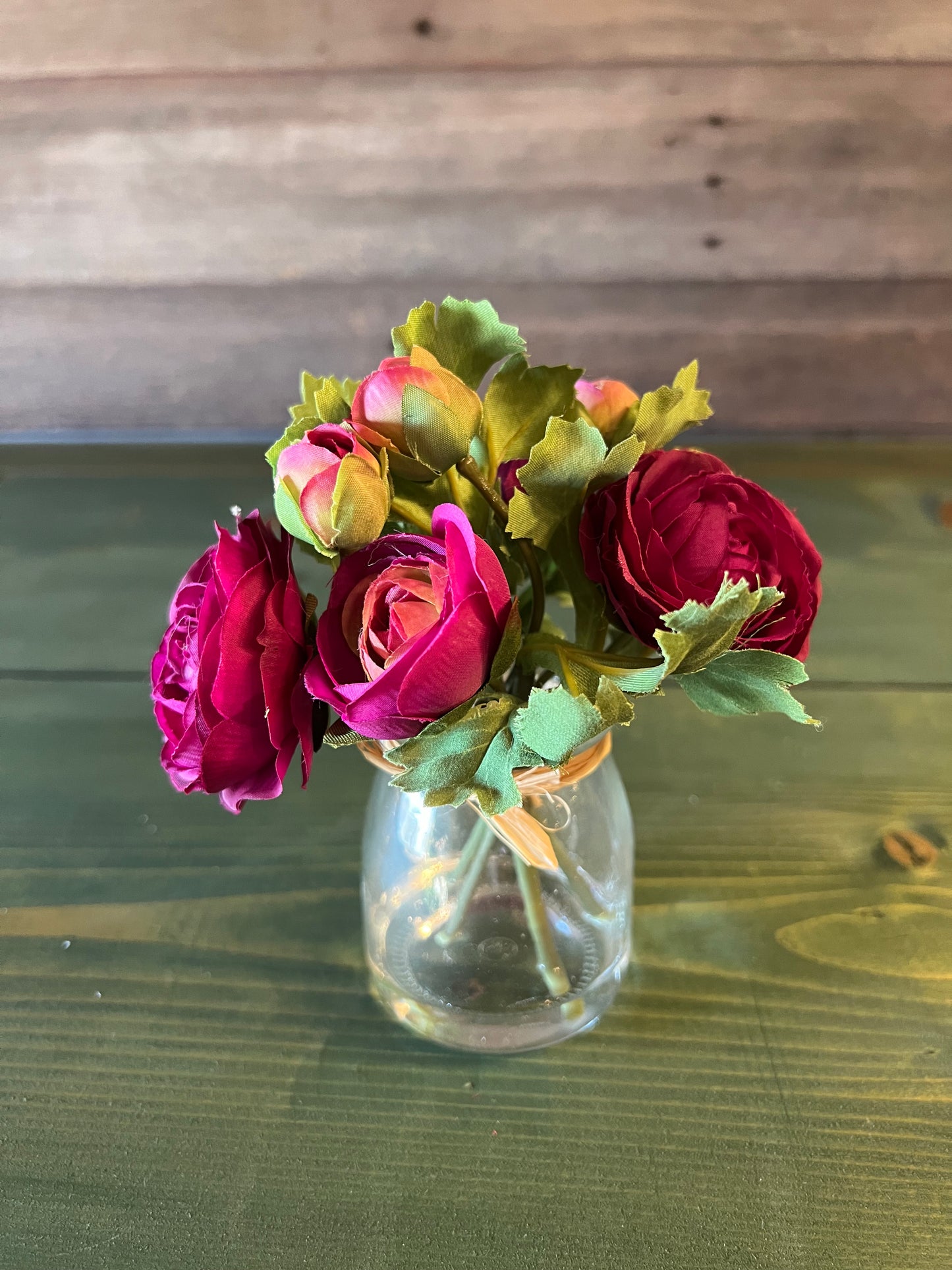 Purple Ranunculus in Glass Vase