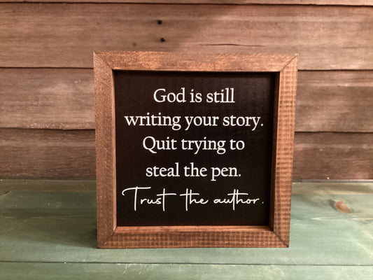 God Is Still Writing Your Story… Black Background Sign